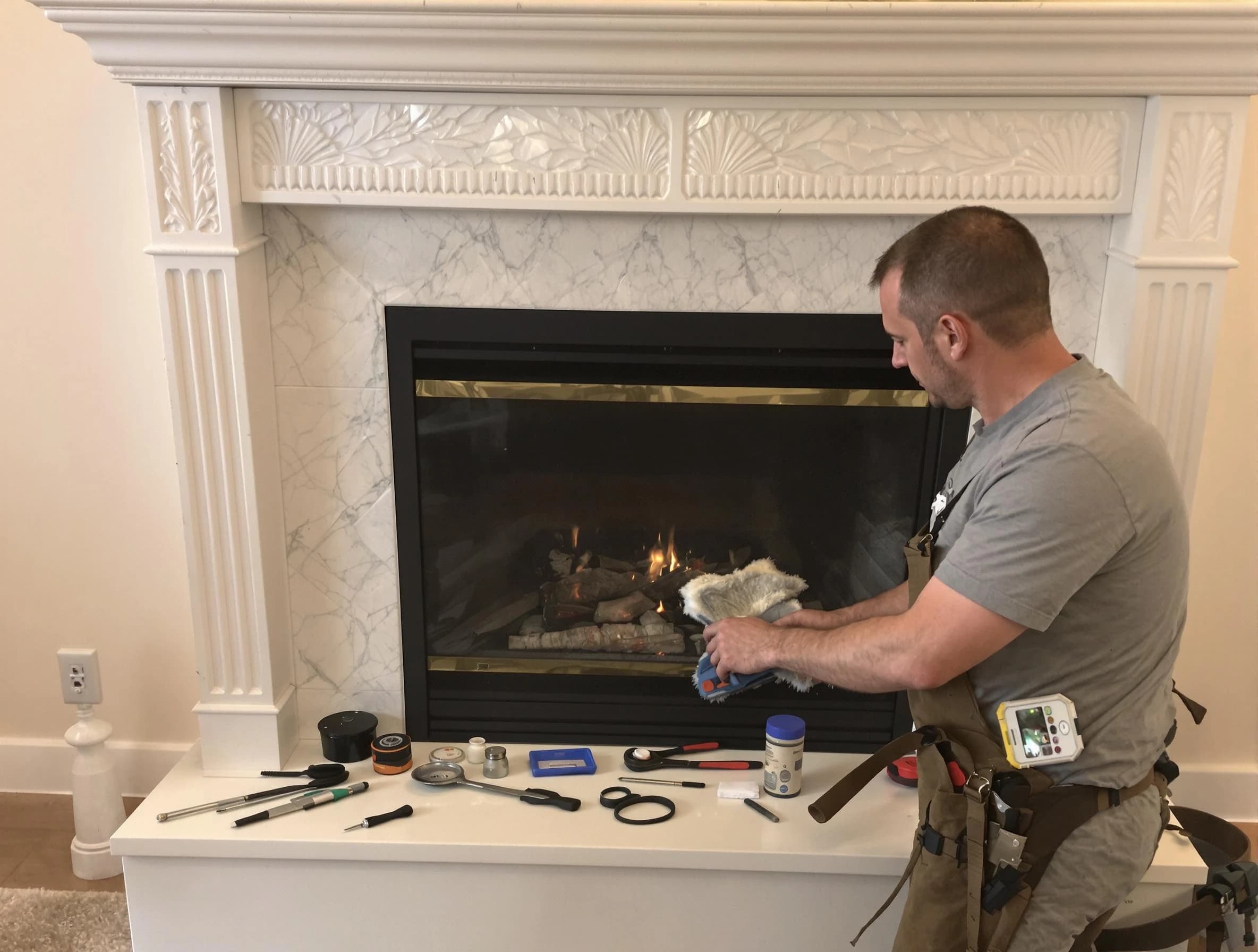 Peachtree City Chimney Sweep performing fireplace maintenance in Peachtree City, GA